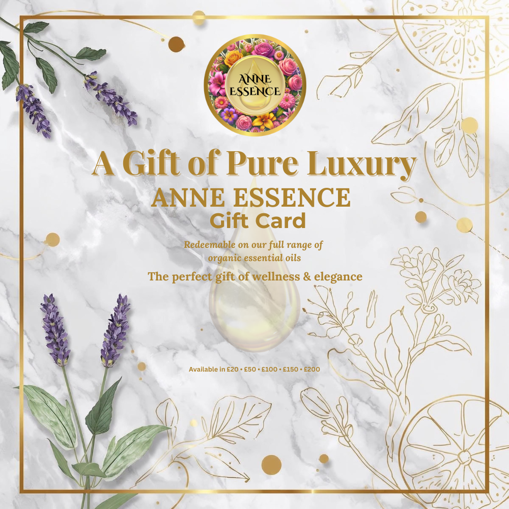 Anne Essence gift card with floral design and essential oil bottle on marble background