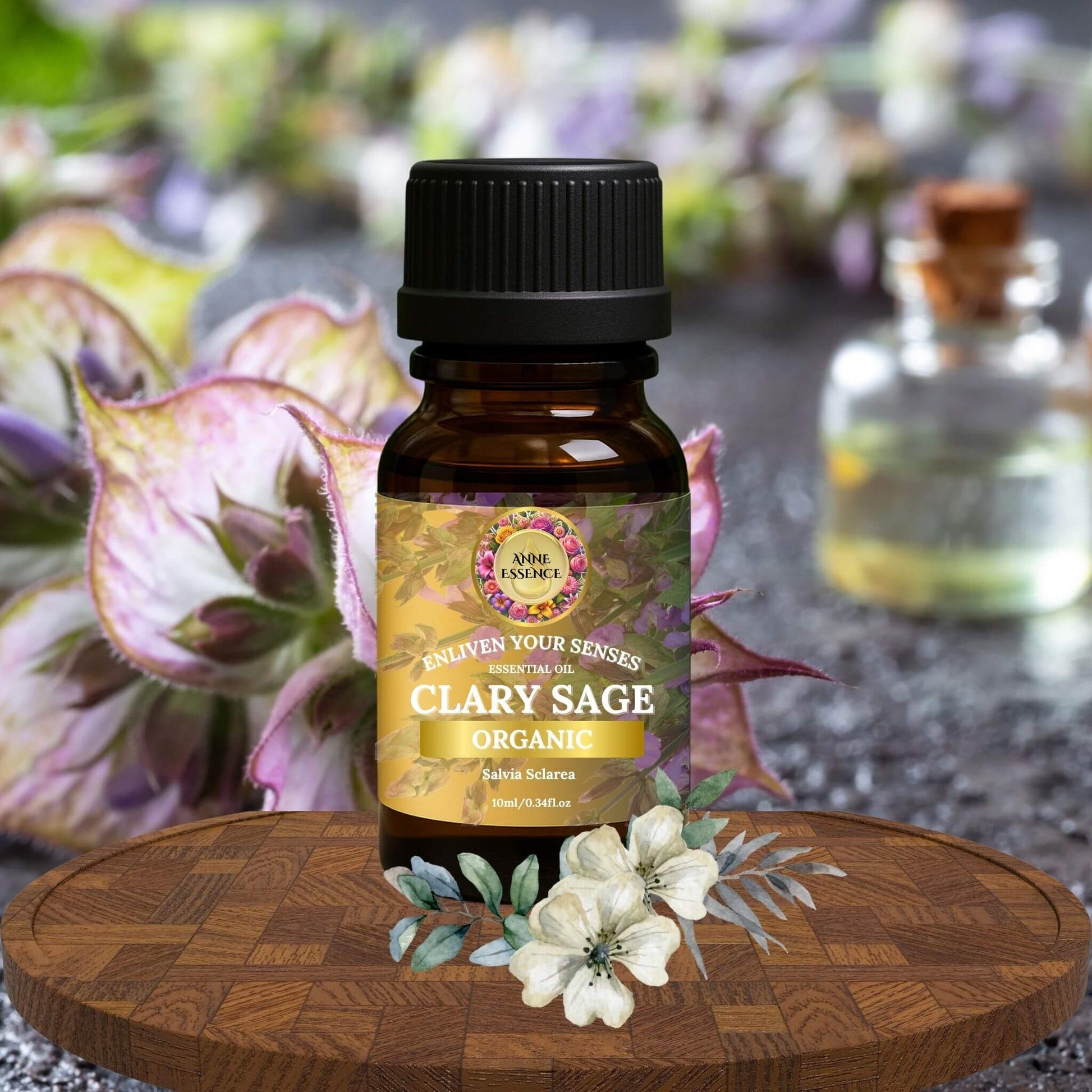 Anne Essence Organic Clary Sage Essential Oil bottle on a wooden surface with flowers in the background