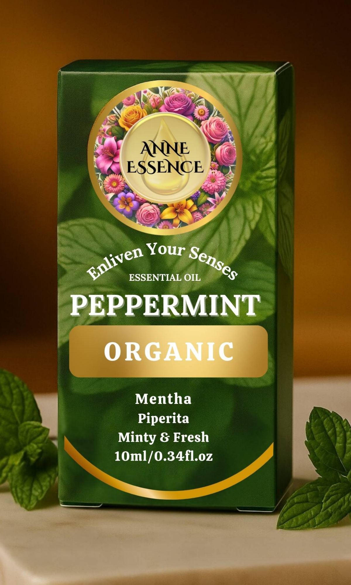 Green box of Anne Essence Peppermint Organic essential oil with floral design on a brown background