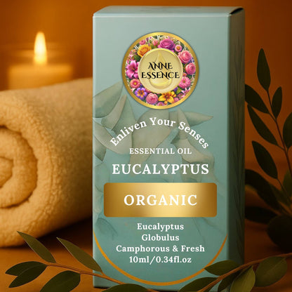 Box of Anne Essence Eucalyptus essential oil with a candle and towel in the background