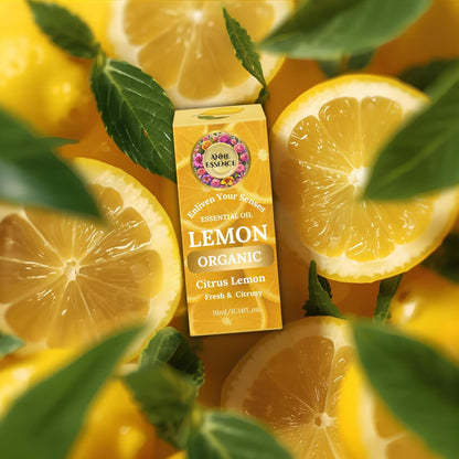 Anne Essence Organic Lemon Essential Oil box surrounded by sliced lemons and fresh green leaves
